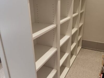 White open shelf cabinet in office space