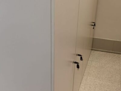 Cabinets with lockable swing doors in office space