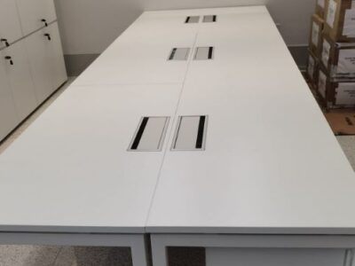 White workstations in office space